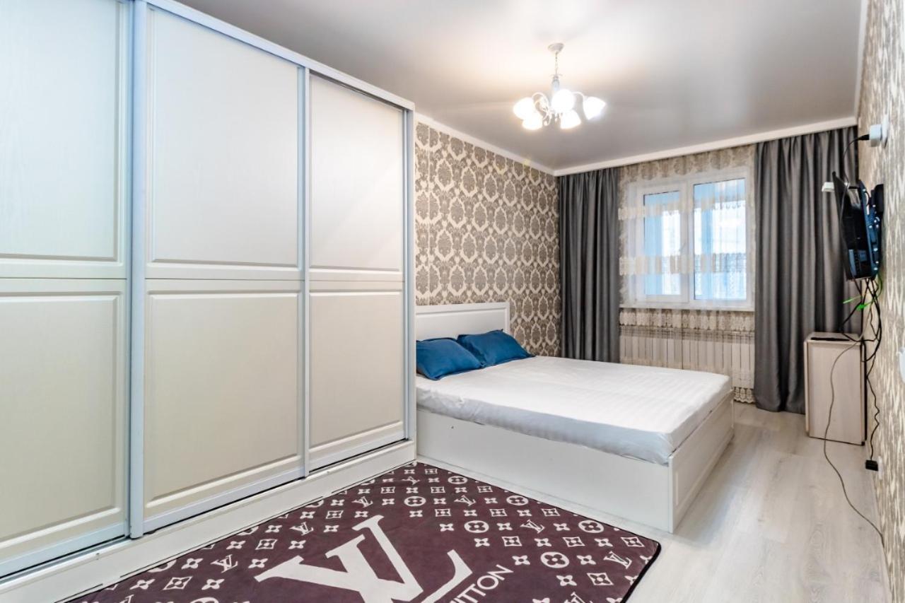 Apartments 7 Я-34 أستانا المظهر الخارجي الصورة